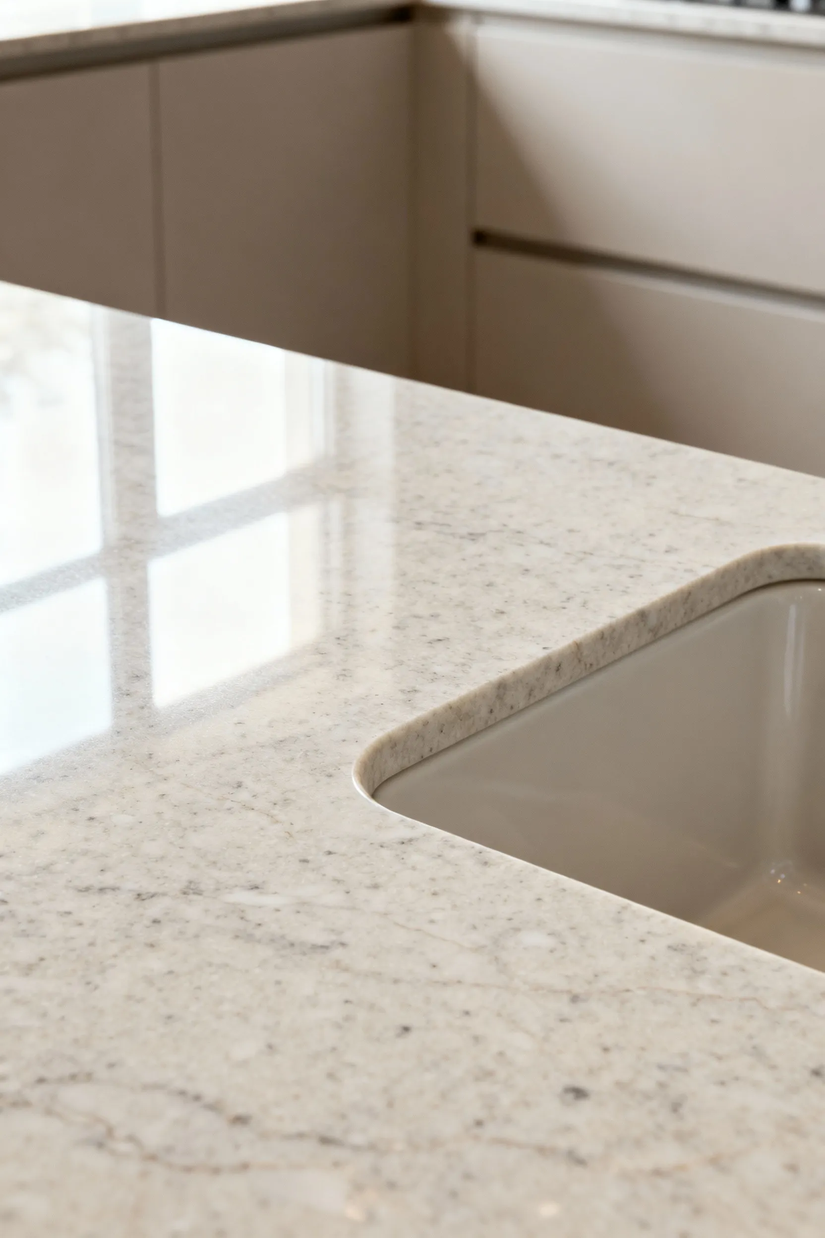 Kitchen countertop resurfacing project achieving a luxurious faux-granite finish, showcasing a high-end look on a budget.